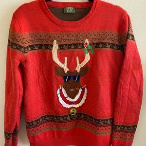 Dutch Bros. Christmas Sweater. Does not have a tag. Fits like a woman’s medium.